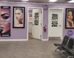 Private room doors beside the lash wall
